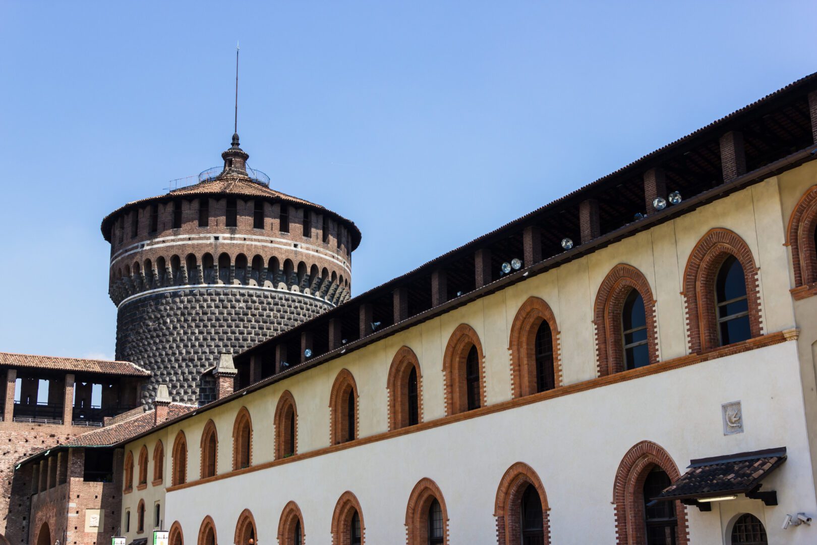 A building with a tower in the background