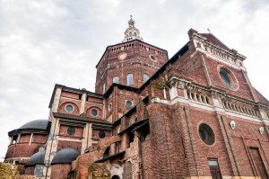 A large brick building with a clock tower.