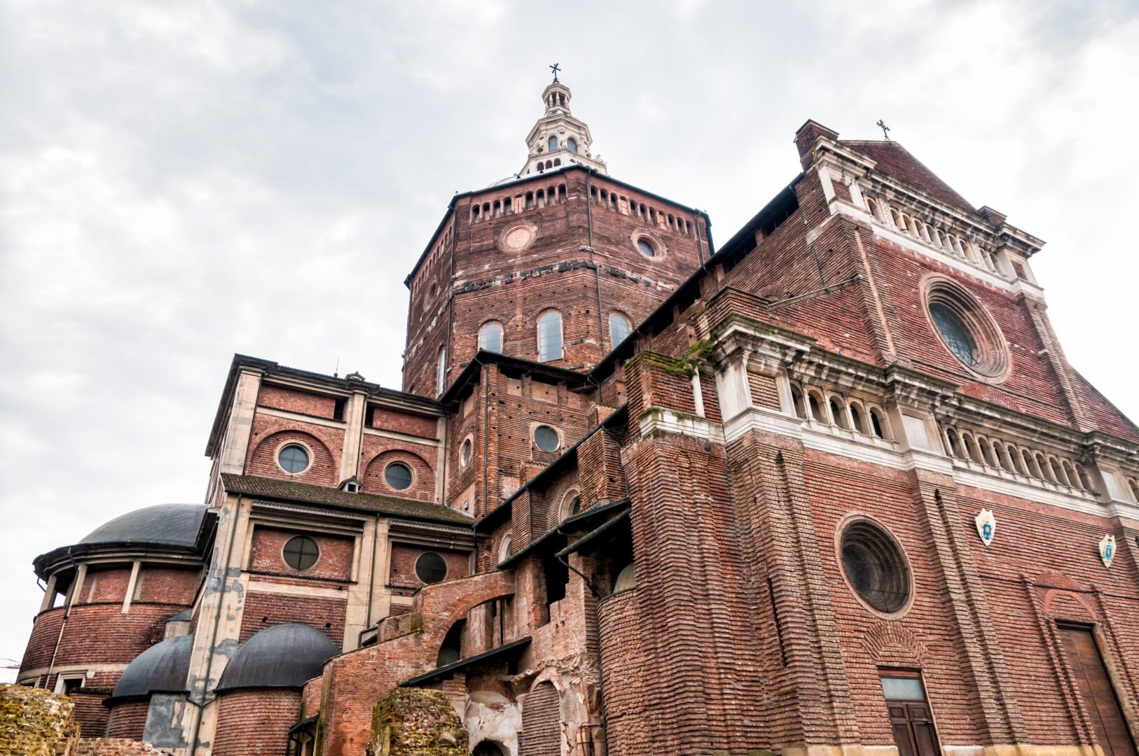 A large brick building with a clock tower.