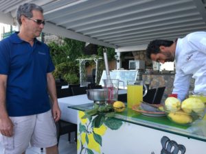 Chef Fiore on the Amalfi Coast teaches the group how to make Limoncello