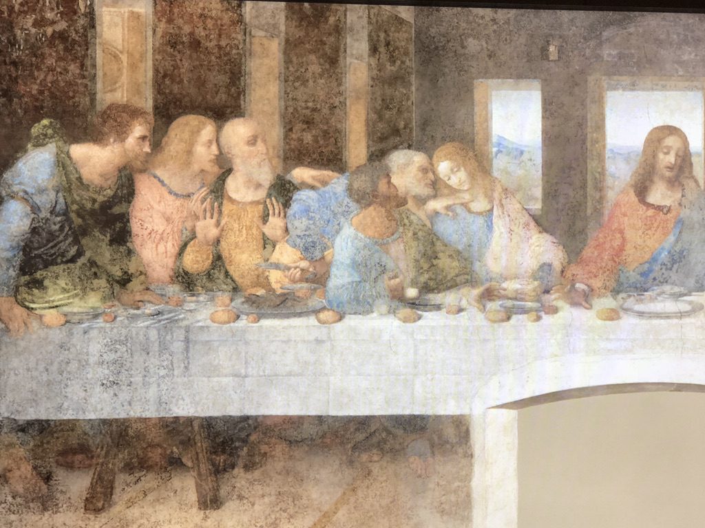 A painting of the last supper with jesus and his disciples.