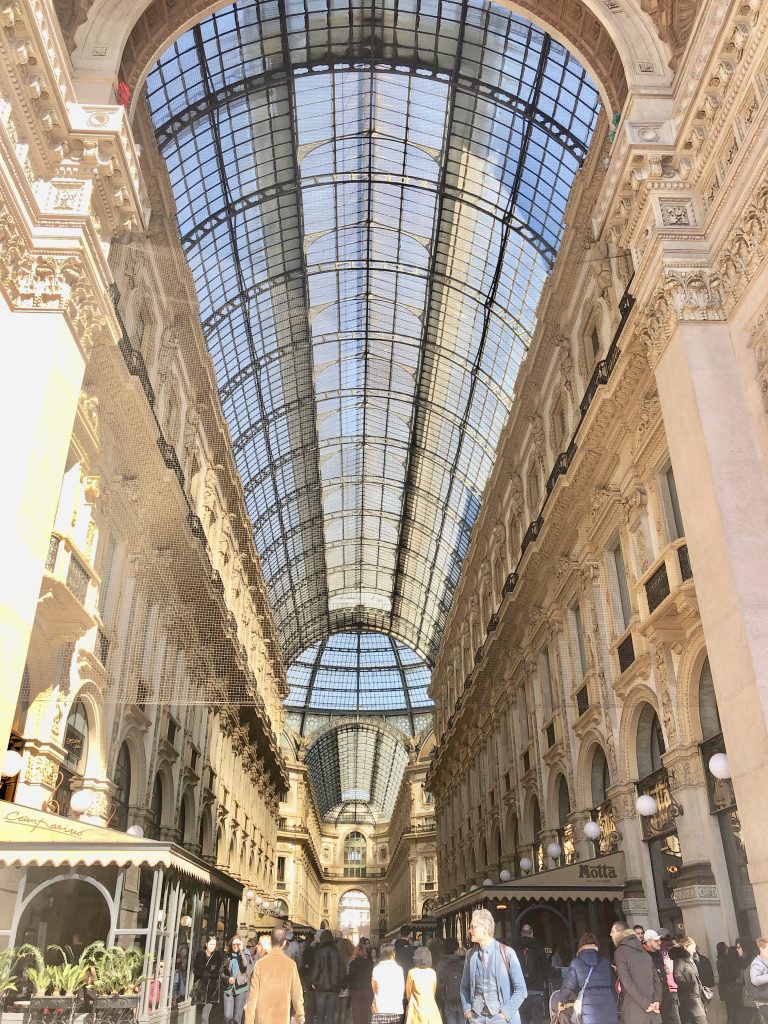 A large building with many windows and glass ceilings.